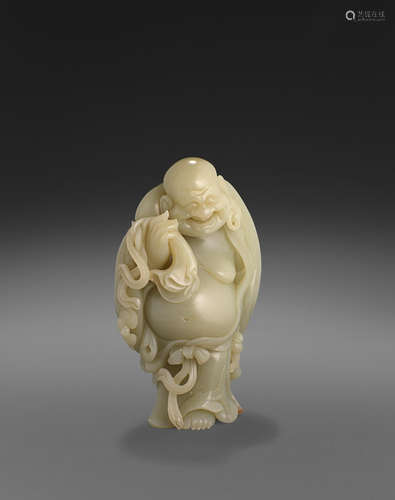 A carved hardstone figure of Budai