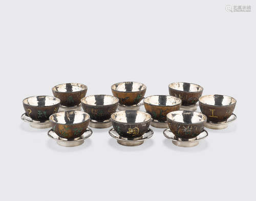 Republic period A set of ten carved coconut shell tea cups and saucers