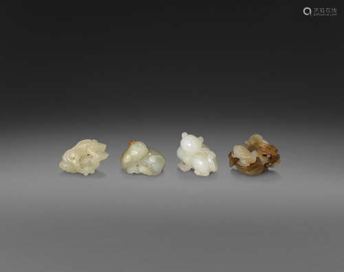 A group of four small jade carvings