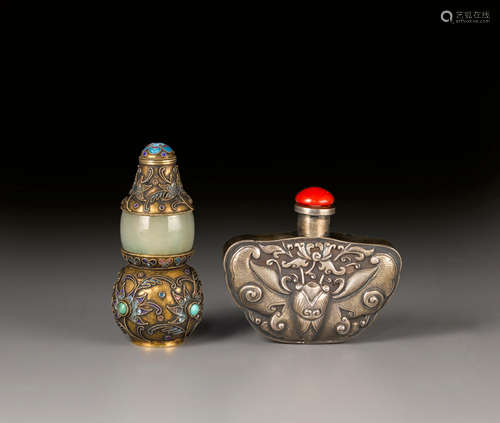 19th/early 20th century Two jade-inset metal snuff bottles