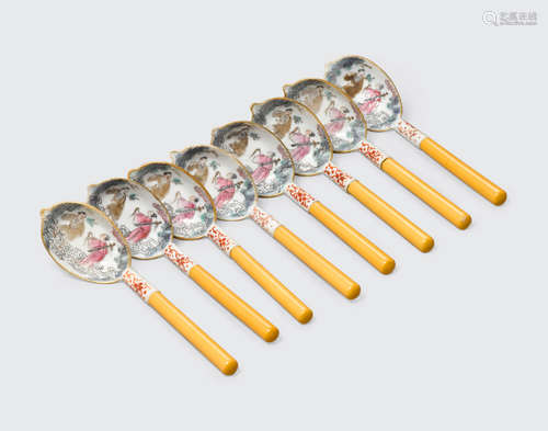 A group of eight famille-rose porcelain and lacquered wood spoons