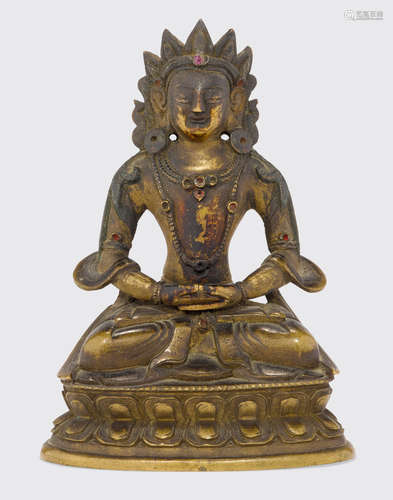 18th century A small Sino-Tibetan gilt copper alloy seated figure of Amitayus