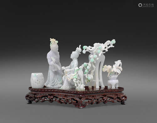 A group of carved jadeite figures