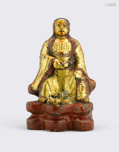 Ming dynasty or later A gilt and polychrome lacquered bronze figure of Zhenwu