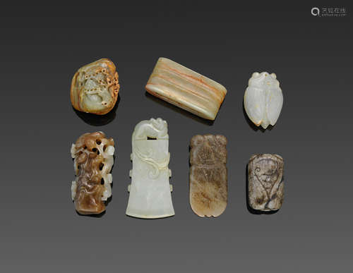 a group of Seven jade carvings