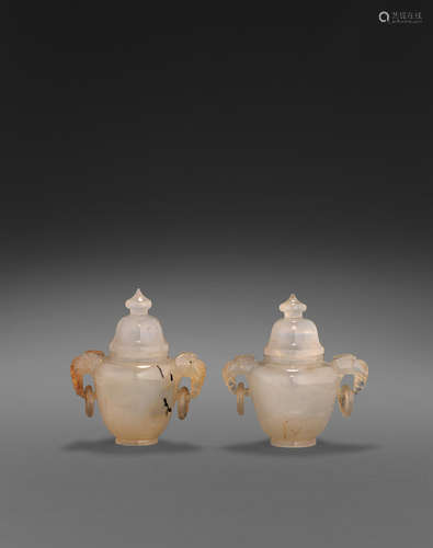 A pair of miniature carved agate jars and covers