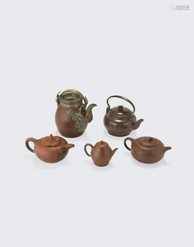 A group of five yixing tea pots