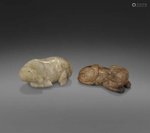 Two carved jade recumbent animals