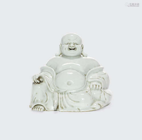 A white porcelain figure of Budai