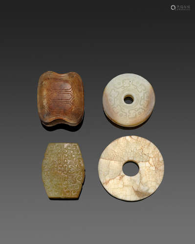 A group of four archaistic jade carvings