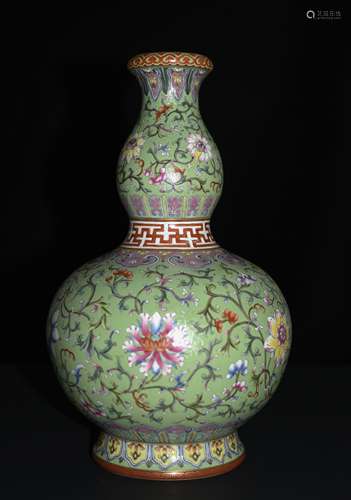 Qianlong Mark, A Green Ground Famille Rose Vase