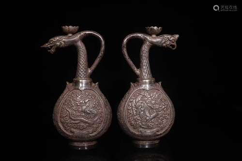 A Pair of Carved Silver Dragon Pots