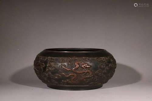 A Carved Bronze Dragon Washer