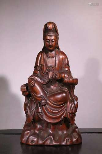 A Carved Hardwood Guanyin Statue