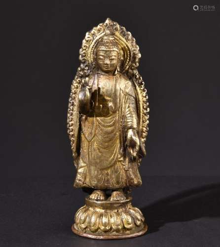 Preaching Buddha Shakyamuni. Old Tibetan or Chinese Buddhist sculpture.