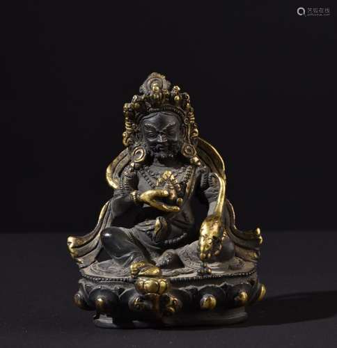 Yellow Jambhala. Old Tibetan gilt bronze Buddha statue.