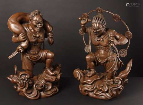 Fujin and Raijin. Extremely impressive and important pair of statues.