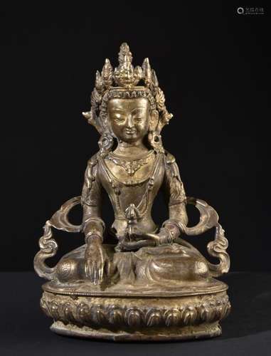 Buddha Akshobhya. Old Tibetan or Chinese gilt Buddhist statue.