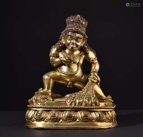 Black Jambhala (Kubera). Tibetan or Chinese gilt bronze Buddha statue.