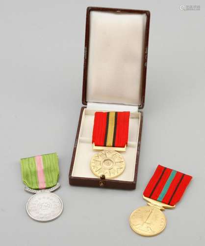 Afghanistan. Convolute of 3 medals and 1 award case.