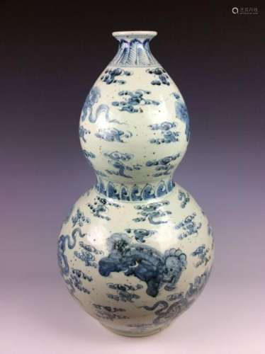 Chinese double gourd bottle vase  with lions.