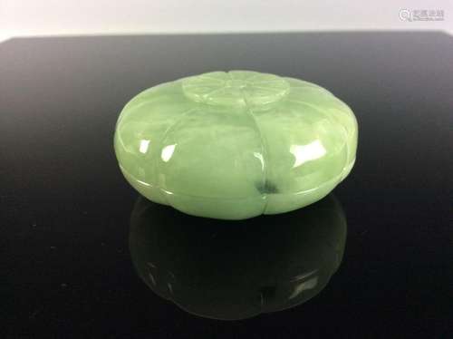 Chinese jadeite carved round box in shape of flower.