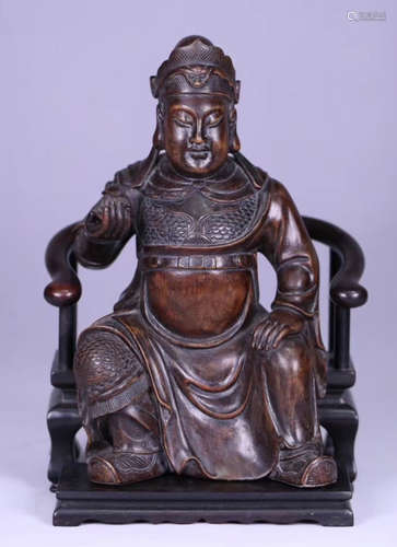 A CHENXIANG WOOD FIGURE AND ZITAN WOOD CHAIR