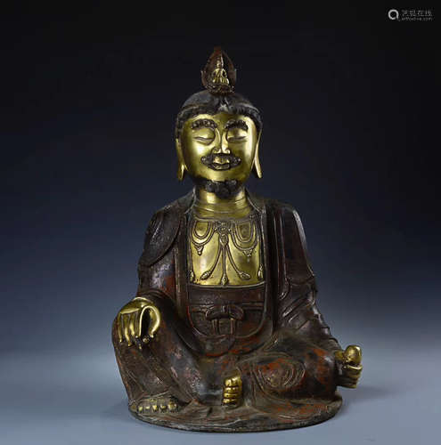 A GILT BRONZE GUANYIN DESIGN FIGURE.