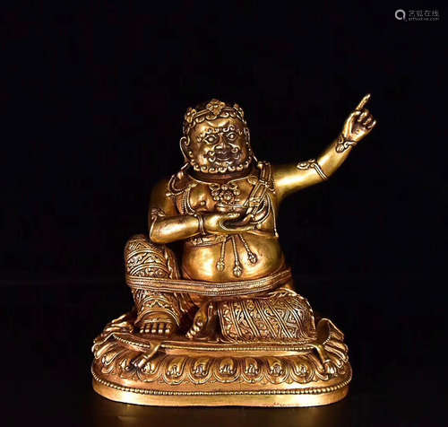 17TH CENTURY, A TIBETAN GILT BRONZE FIGURE