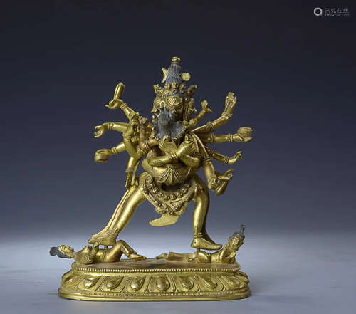 A GILT BRONZE BUDDHA DESIGN FIGURE