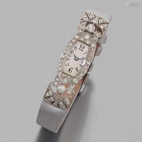 ANNÉES 1930 MONTRE DE DAME DIAMANTS A diamond and platinum lady’s wristwatch, circa 1930.