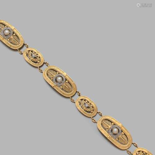 LUCIEN GAUTRAIT ANNÉES 1905 BRACELET STYLE LOUIS XVI A diamond, pearl and gold bracelet by Lucien GAUTRAIT, circa 1905.