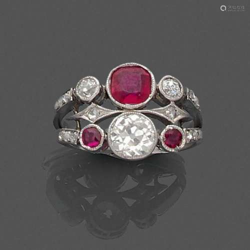 BAGUE TOI ET MOI A diamond, ruby and platinum ring.