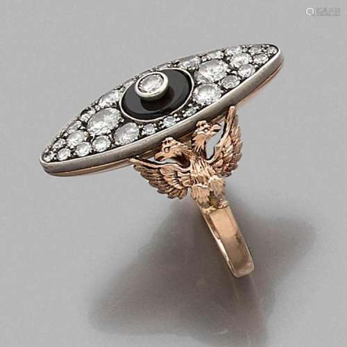 BAGUE MARQUISE DIAMANTS A diamond, onyx, gold and silver ring.