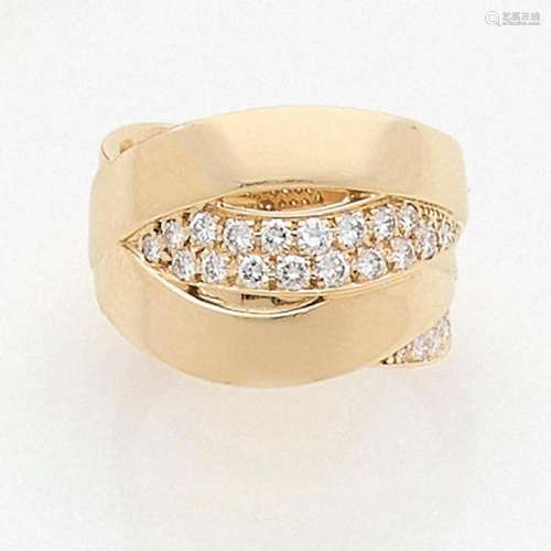 CHANEL LARGE ANNEAU TRESSE A diamond and gold ring by CHANEL.