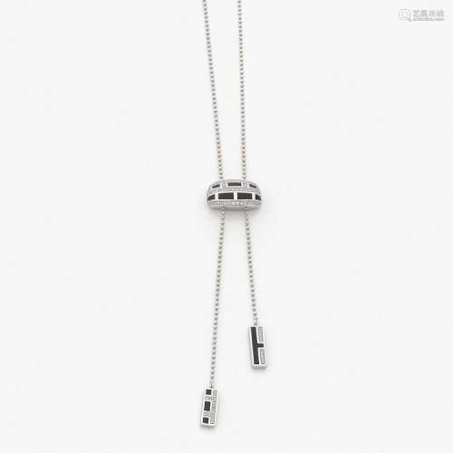 MAUBOUSSIN “COLLECTION LE VICE ET LA VERTU” PENDENTIF “LE VICE” A diamond, laquer and gold pendant by MAUBOUSSIN.