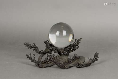 A BRONZE SCULPTURE  WITH A CRYSTAL BALL, 20TH CENTURY