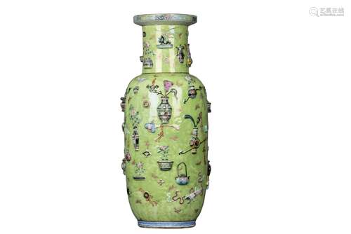 A MOULDED GREEN-GROUND FAMILLE ROSE 'HUNDRED ANTIQUES' VASE