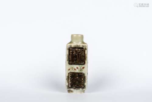 A FAMILLE ROSE ENAMEL CELADON SNUFF BOTTLE, MID-QING PERIOD