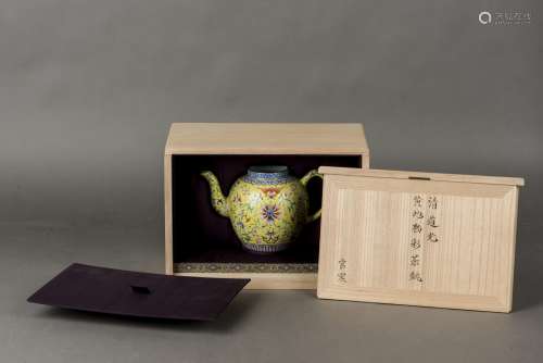 A YELLOW GROUND FAMILLE ROSE TEAPOT, QING DYNASTY, DAOGUANG PERIOD
