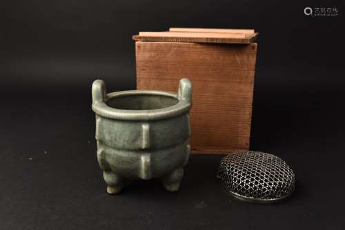 A CELADON BRONZE -FORM TRIPO CENSER