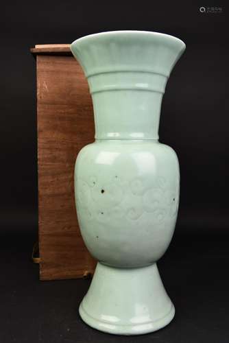 A CELADON PORCELAIN BEAKER VASE