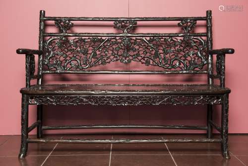 A CHINESE CARVED HARDWOOD BENCH
