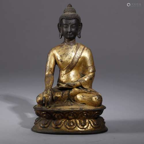 A Chinese tibet gilt bronze figure of buddha shakyamuni, 15th century