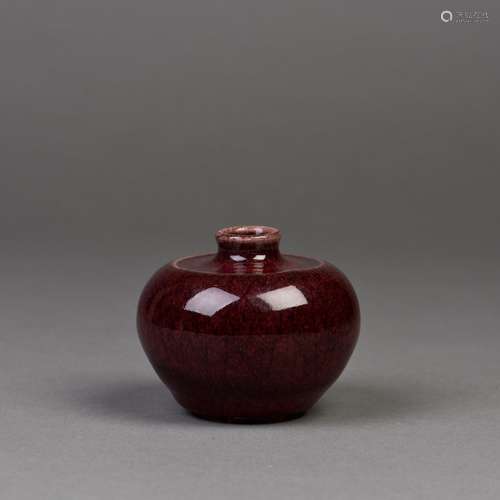 A CHINESE PORCELAIN ZUN WITH MOTTLED CRIMSON GLAZE