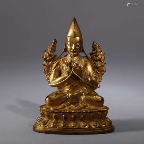 A Chinese sino tibetan gilt bronze figure of Tsongkhapa, 18/19 th century