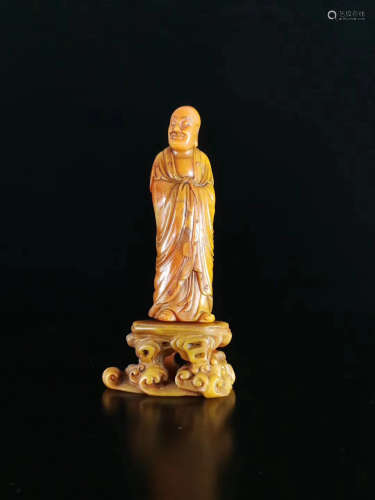 A TIANHUANG STONE STANDING MONK ORNAMENT