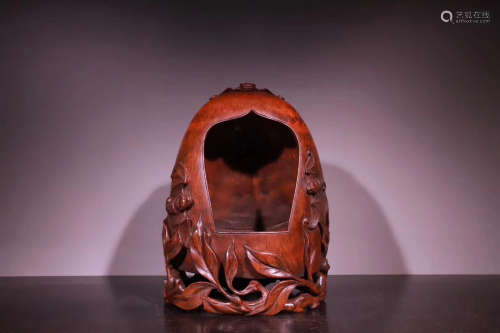 A BAMBOO CARVED BUDDHA CONTAINER
