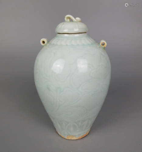 A HUTIAN YAO CARVED FLORAL WITH COVER JAR