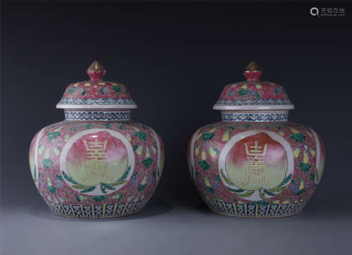 PAIR OF CHINESE FAMILLE ROSE LIDDED JARS